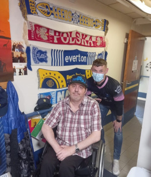 Residents enjoy a kick about with local footballer 